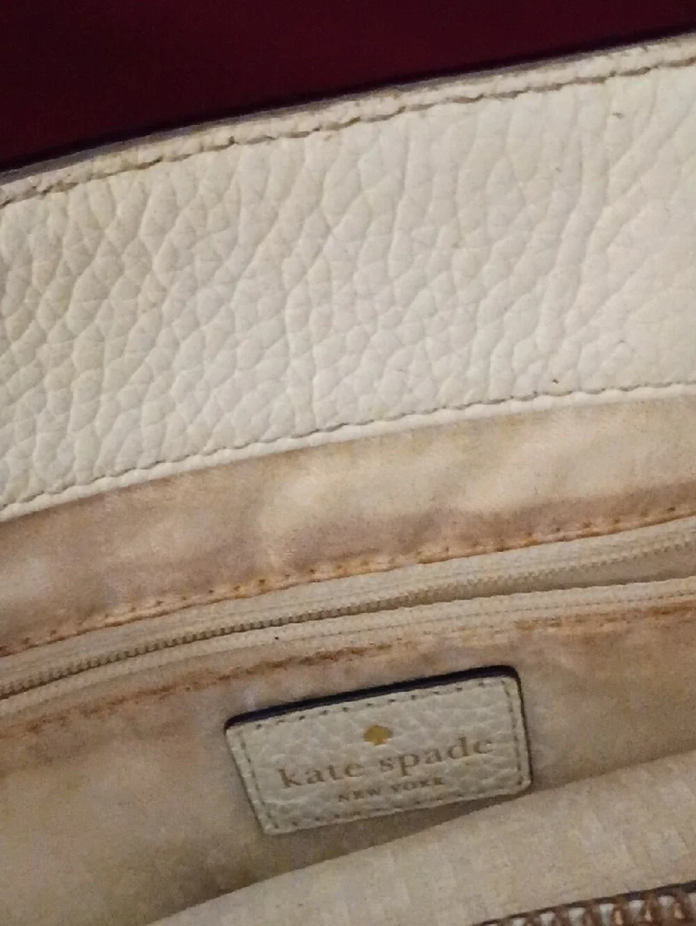 kate spade cream pebble leather tote with tassel